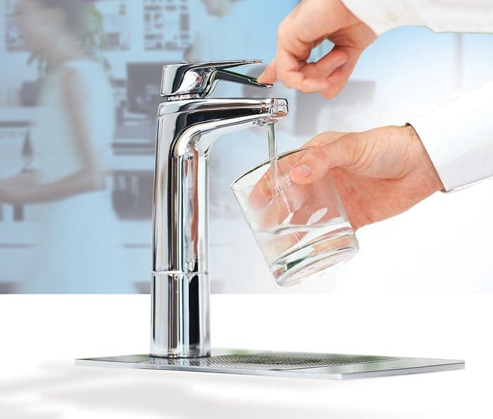 Chrome XL Levered Dispenser with matching riser and font filling glass with filtered water