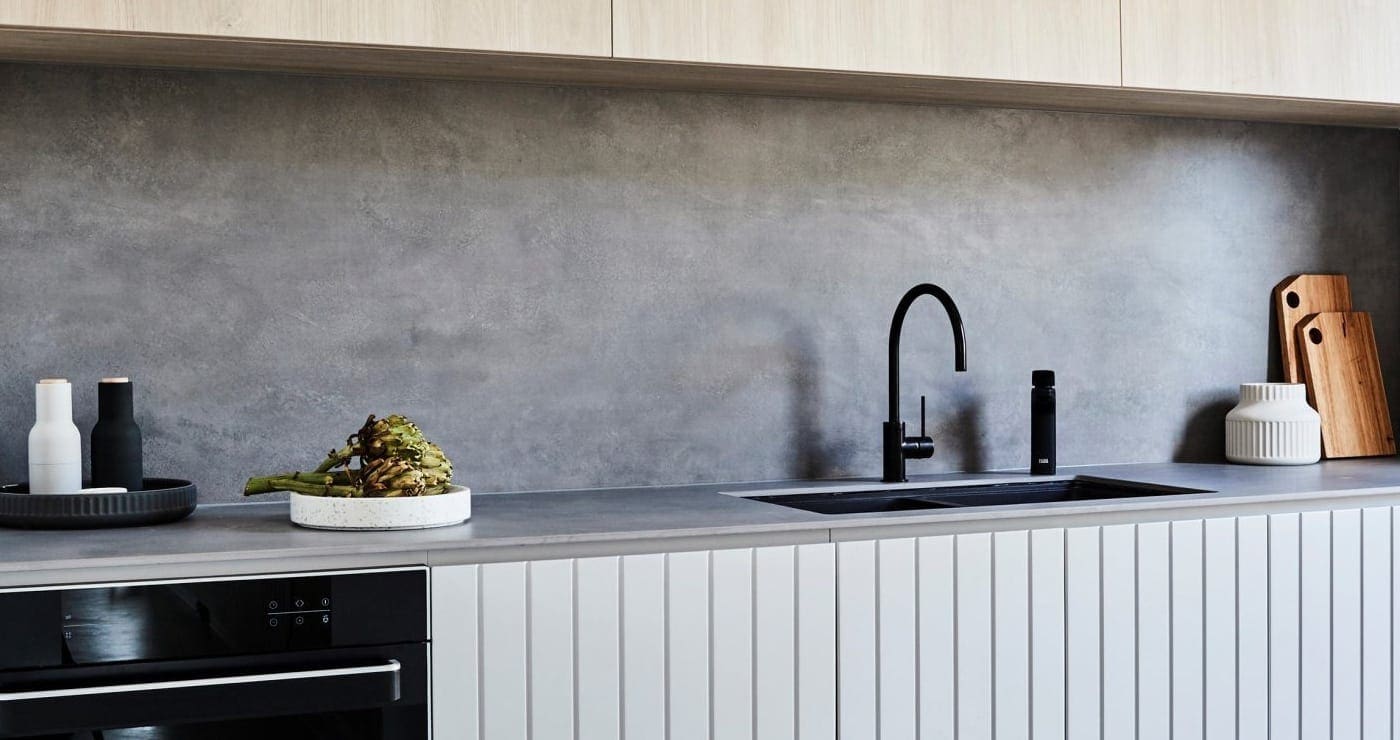 Billi XL Levered Dispenser in matt balck with matching gooseneck mixer on modern kitchen benchtop