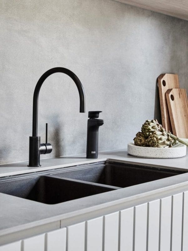 Billi XL Matte Black dispenser on kitchen sink next to mixer tap